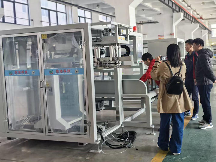 Vietnam Feed Mill Client Visited Our Factory to Inspect Fully Automatic Bag Feeding Packaging Machine